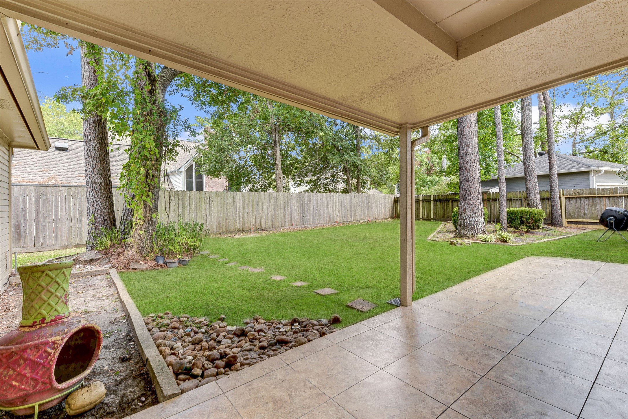 18310 Lake Oaks Drive Spring, TX 77388 - Photo 30 of 31 a view of a porch with furniture and garden