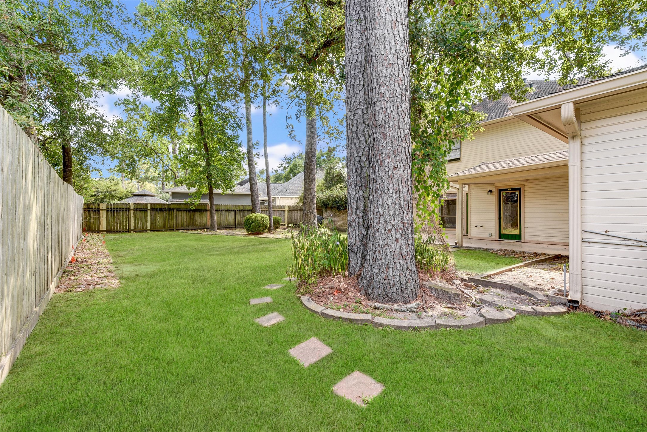 18310 Lake Oaks Drive Spring, TX 77388 - Photo 31 of 31 a view of a house with a yard