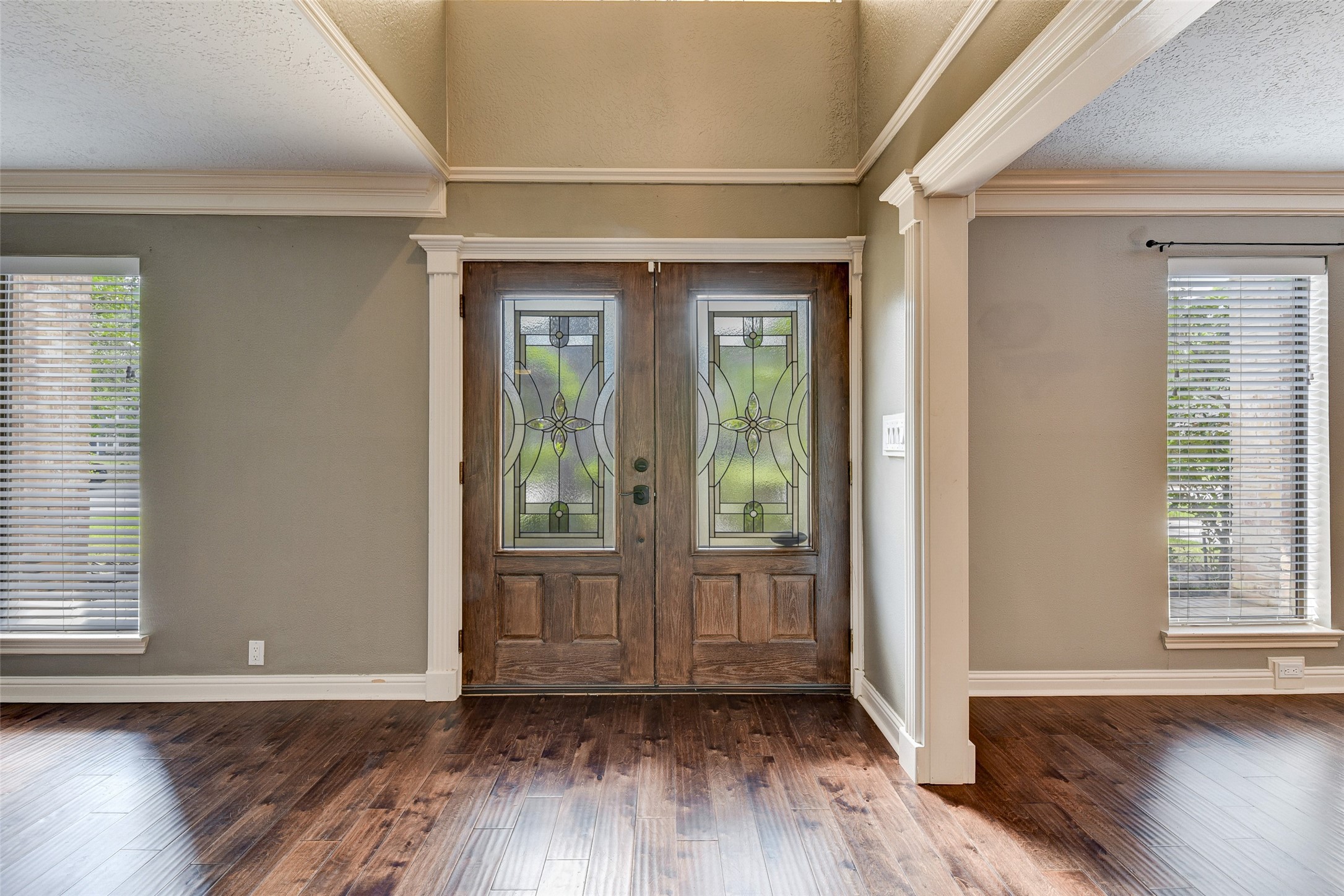 18310 Lake Oaks Drive Spring, TX 77388 - Photo 6 of 31 an empty room with wooden floor and windows