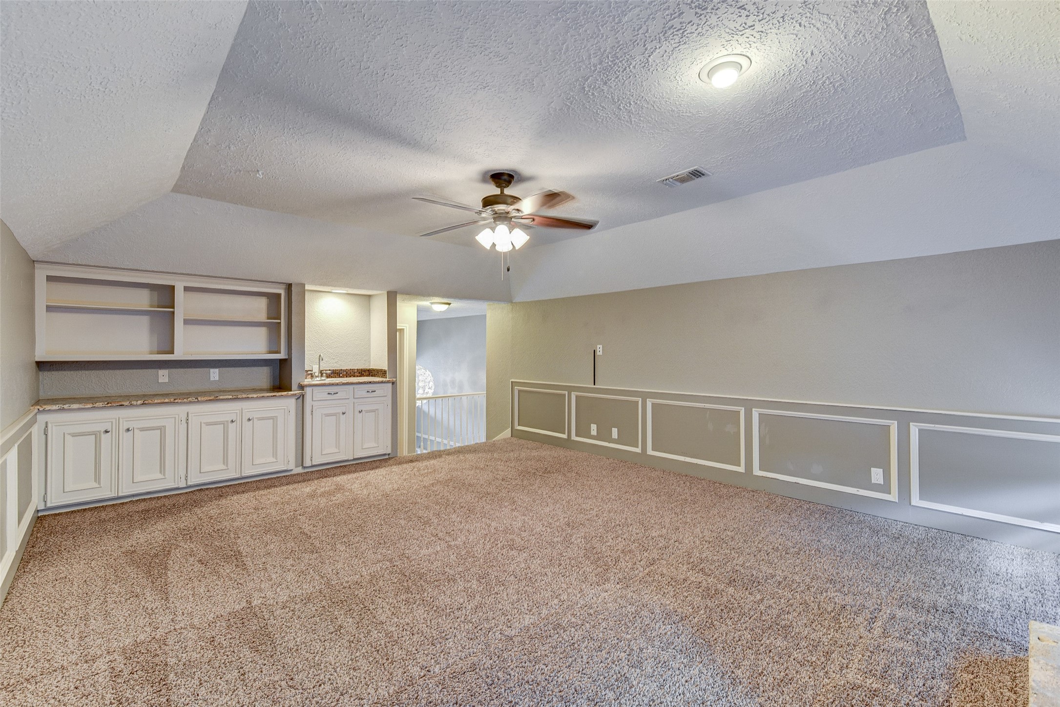 18310 Lake Oaks Drive Spring, TX 77388 - Photo 9 of 31 an empty room with fan and windows