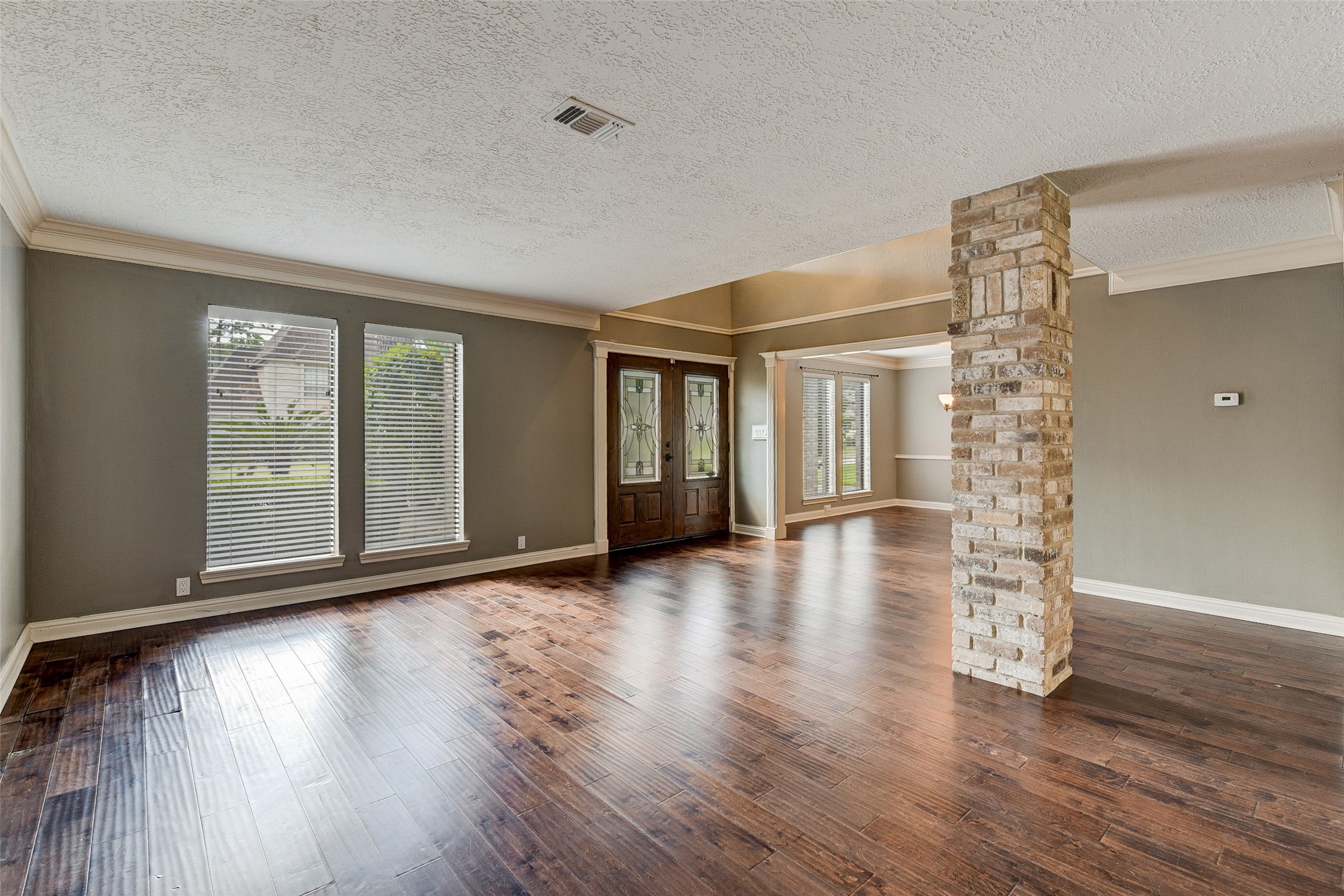 18310 Lake Oaks Drive Spring, TX 77388 - Photo 10 of 31 a view of livingroom with hardwood floor and window