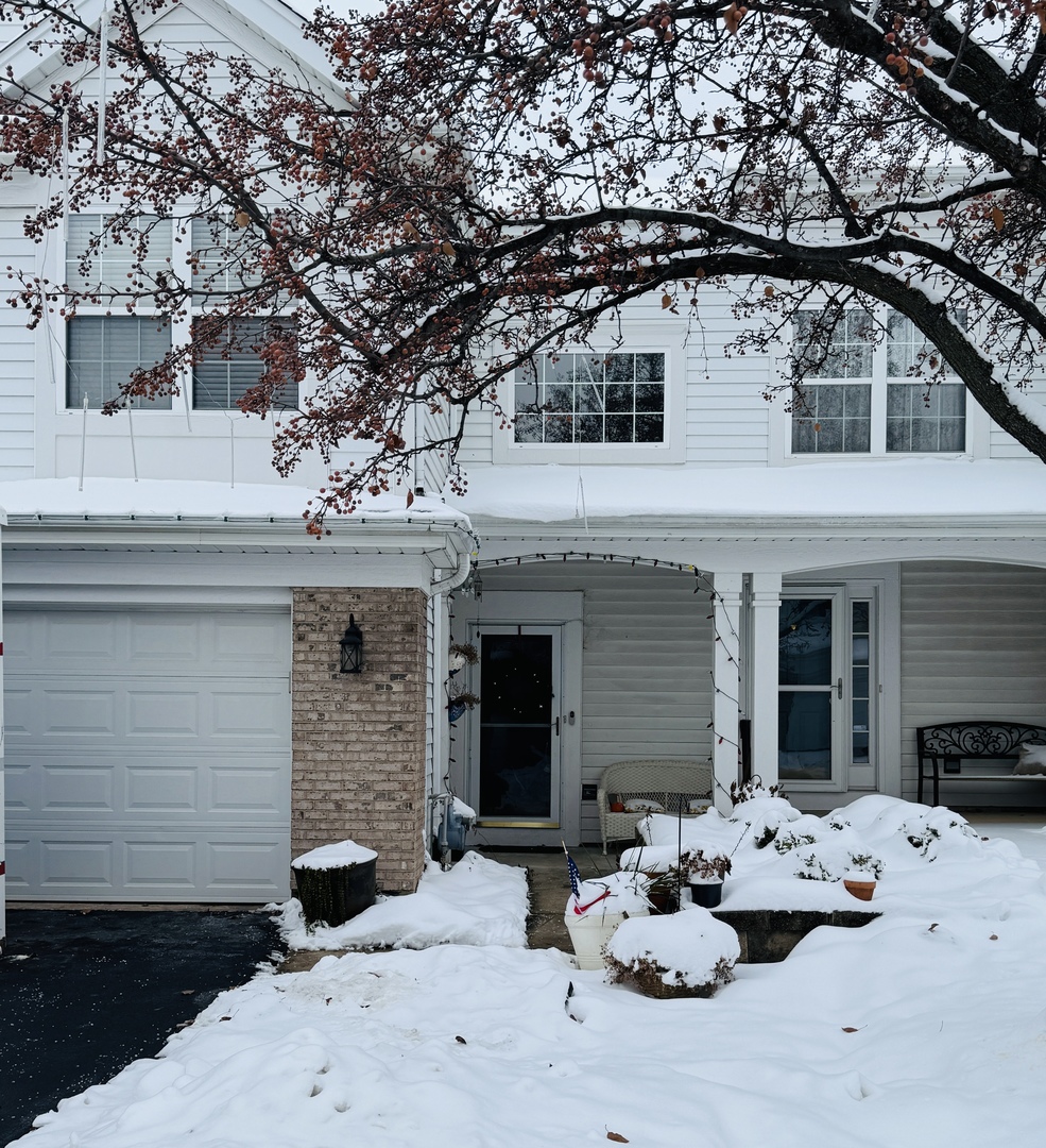 2745 Borkshire Lane, Unit 2745 Aurora, IL 60502 - Photo 1 of 23 a view of a white house with a yard