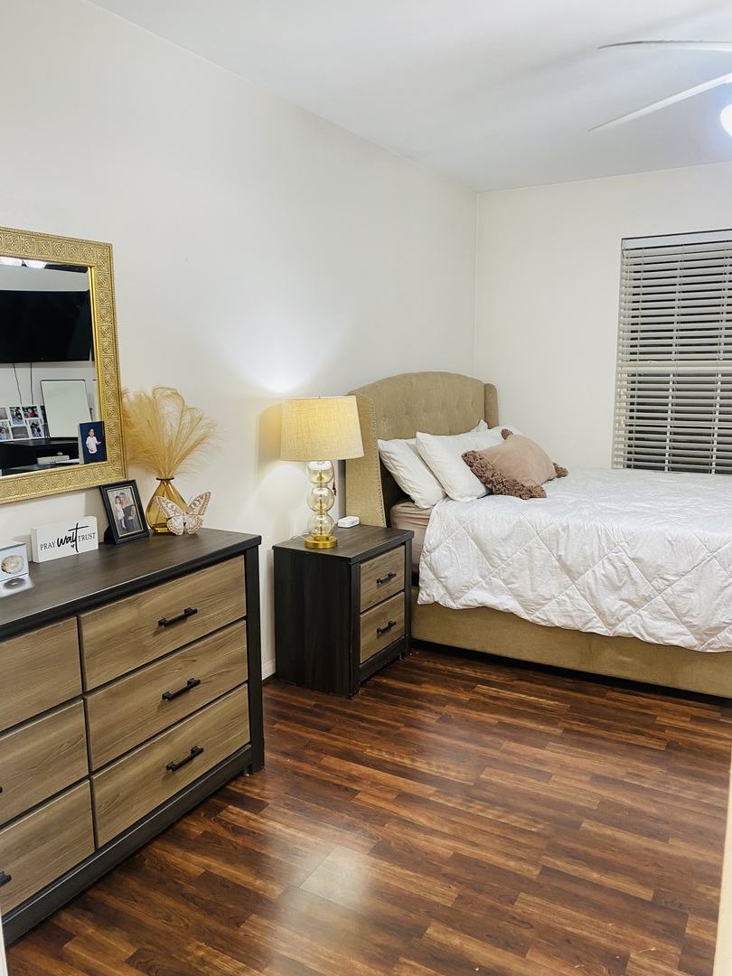 2745 Borkshire Lane, Unit 2745 Aurora, IL 60502 - Photo 11 of 23 a bedroom with a bed and wooden floor