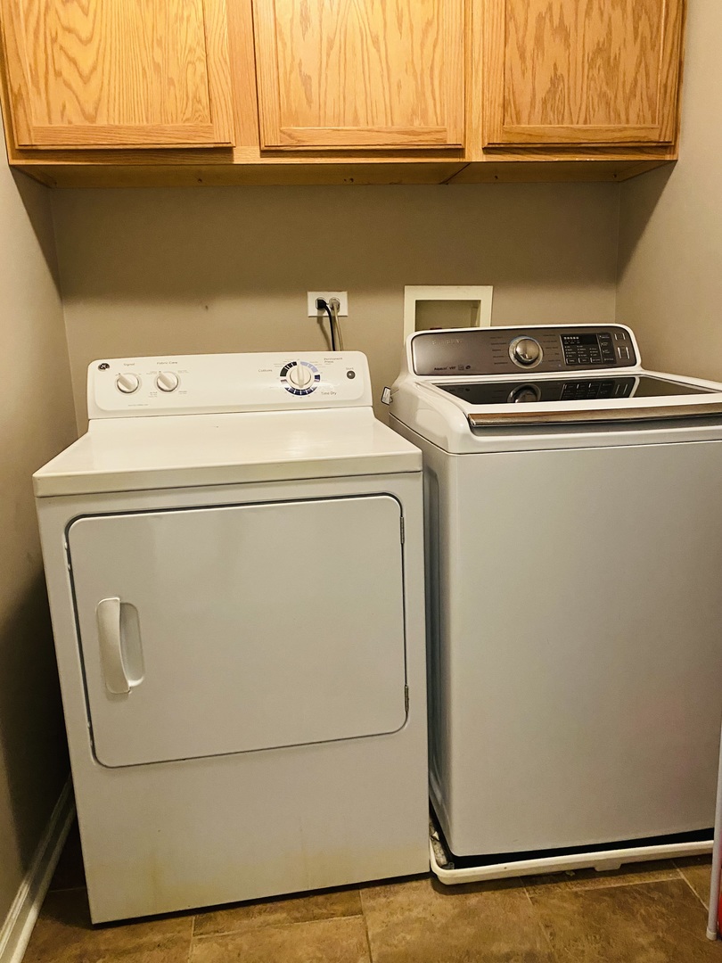 2745 Borkshire Lane, Unit 2745 Aurora, IL 60502 - Photo 23 of 23 a utility room with dryer and washer