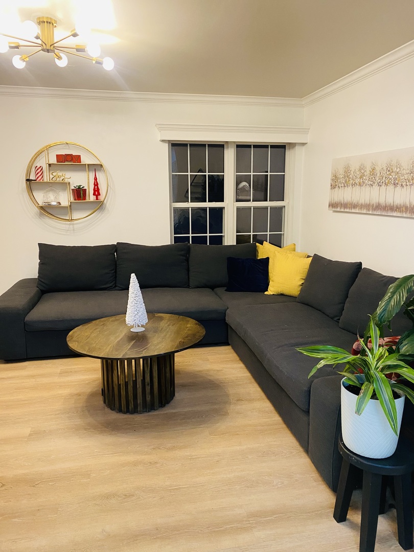 2745 Borkshire Lane, Unit 2745 Aurora, IL 60502 - Photo 4 of 23 a living room with furniture and a large window