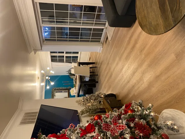 a kitchen with stainless steel appliances granite countertop a refrigerator stove top oven and sink