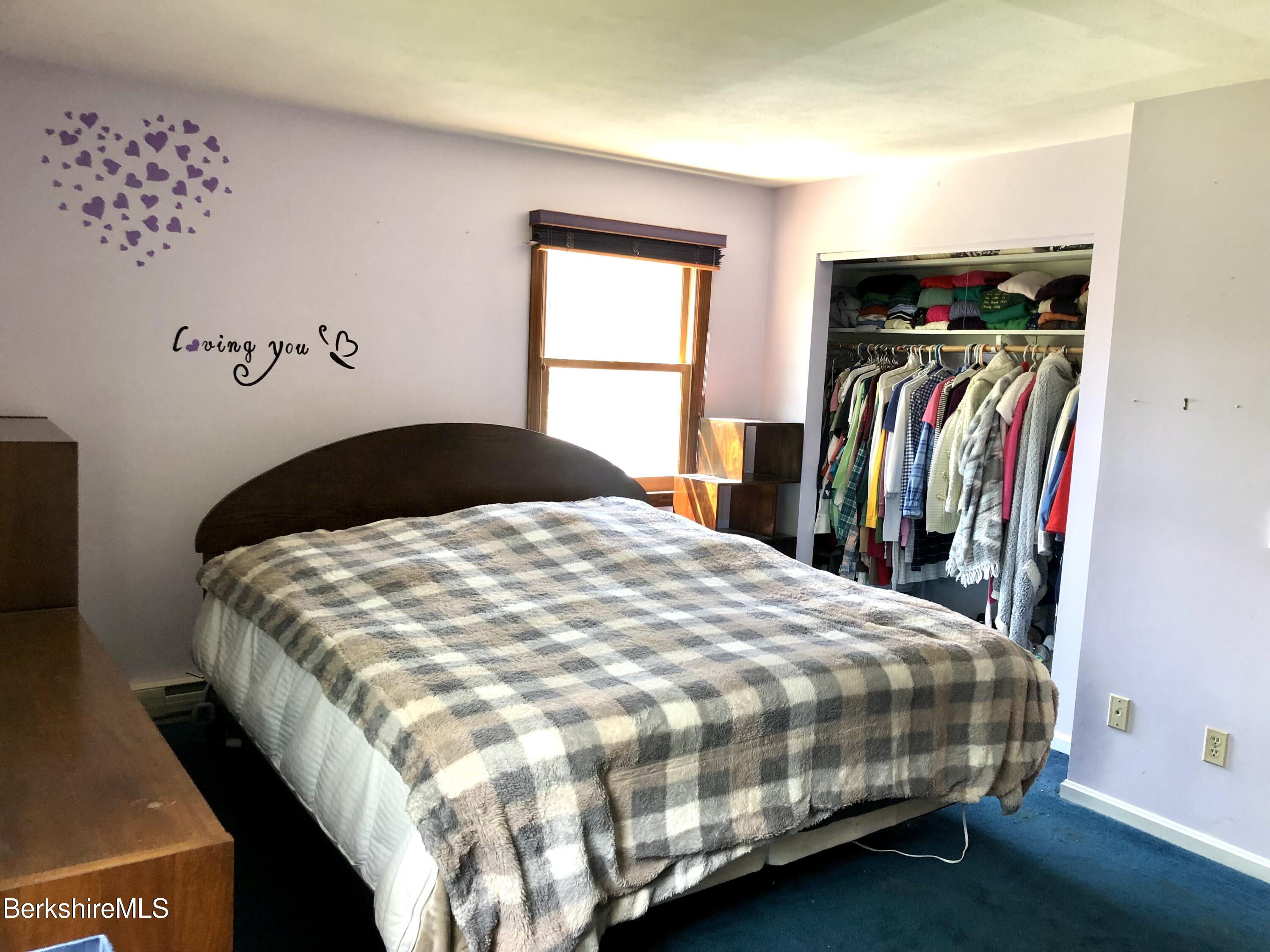 95 Bruce Drive Dalton, MA 01226 - Photo 13 of 30 a bedroom with a bed and a window