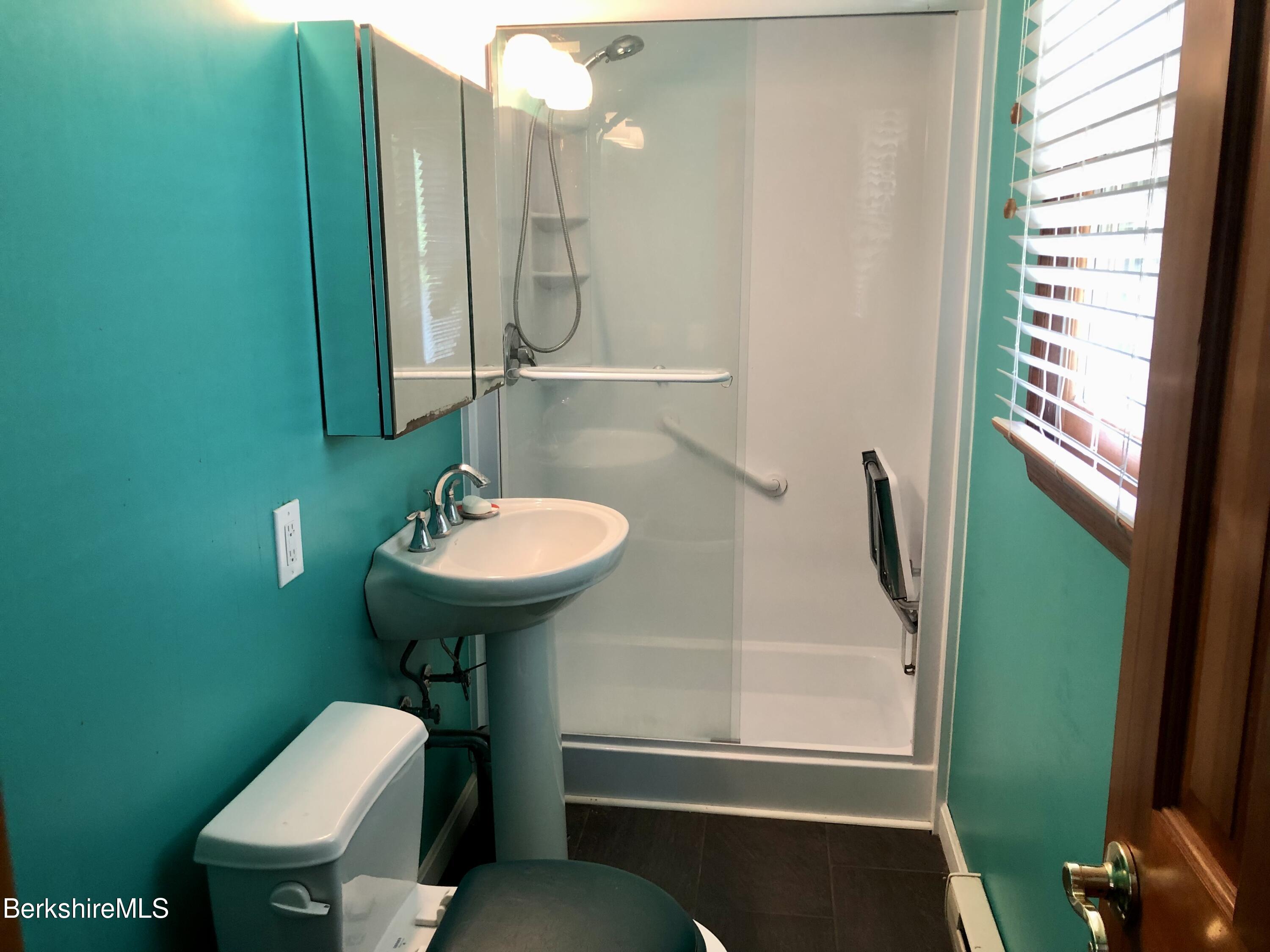 95 Bruce Drive Dalton, MA 01226 - Photo 15 of 30 a bathroom with a sink toilet and a mirror