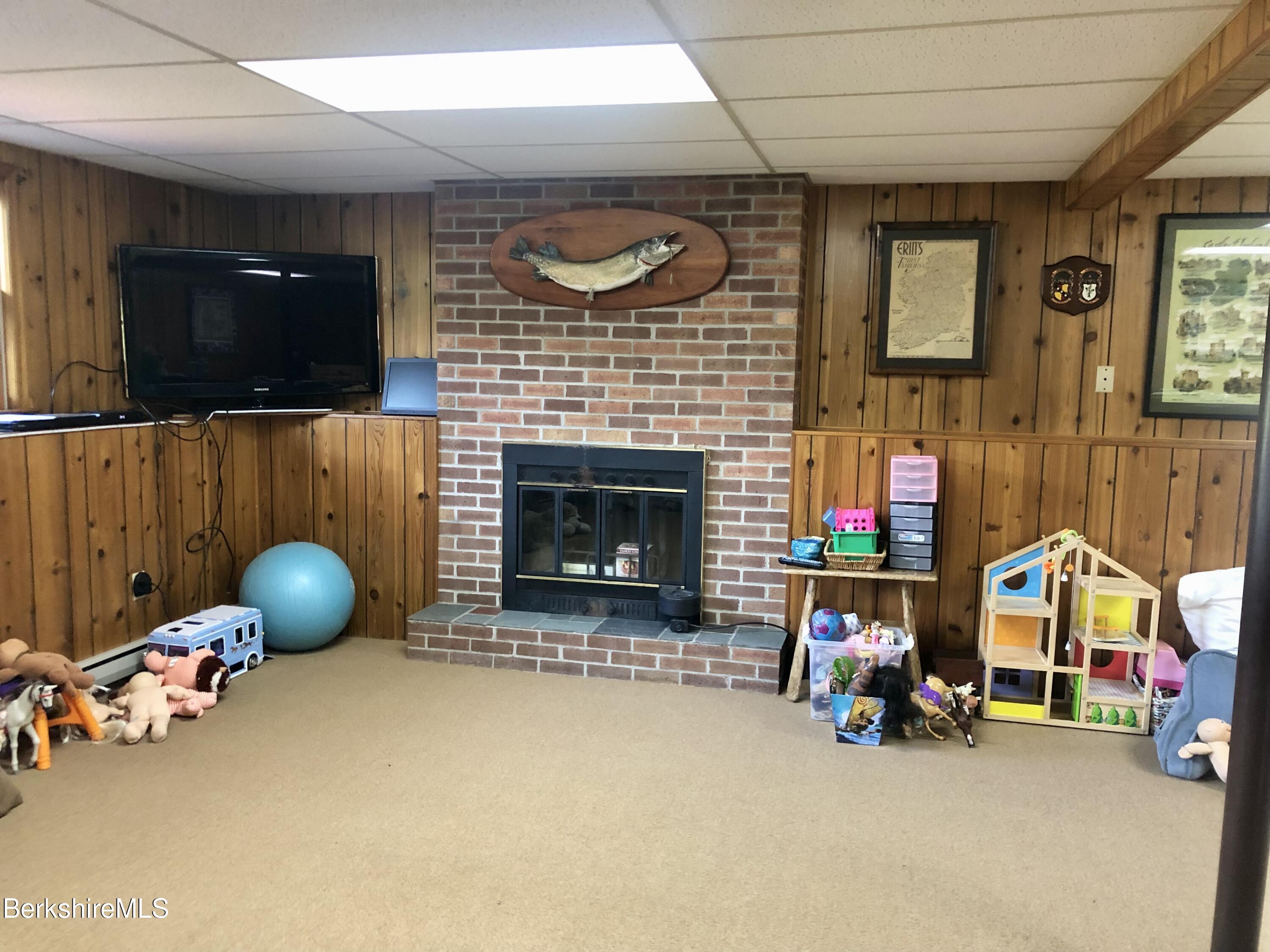 95 Bruce Drive Dalton, MA 01226 - Photo 20 of 30 a room with toys and flat screen tv