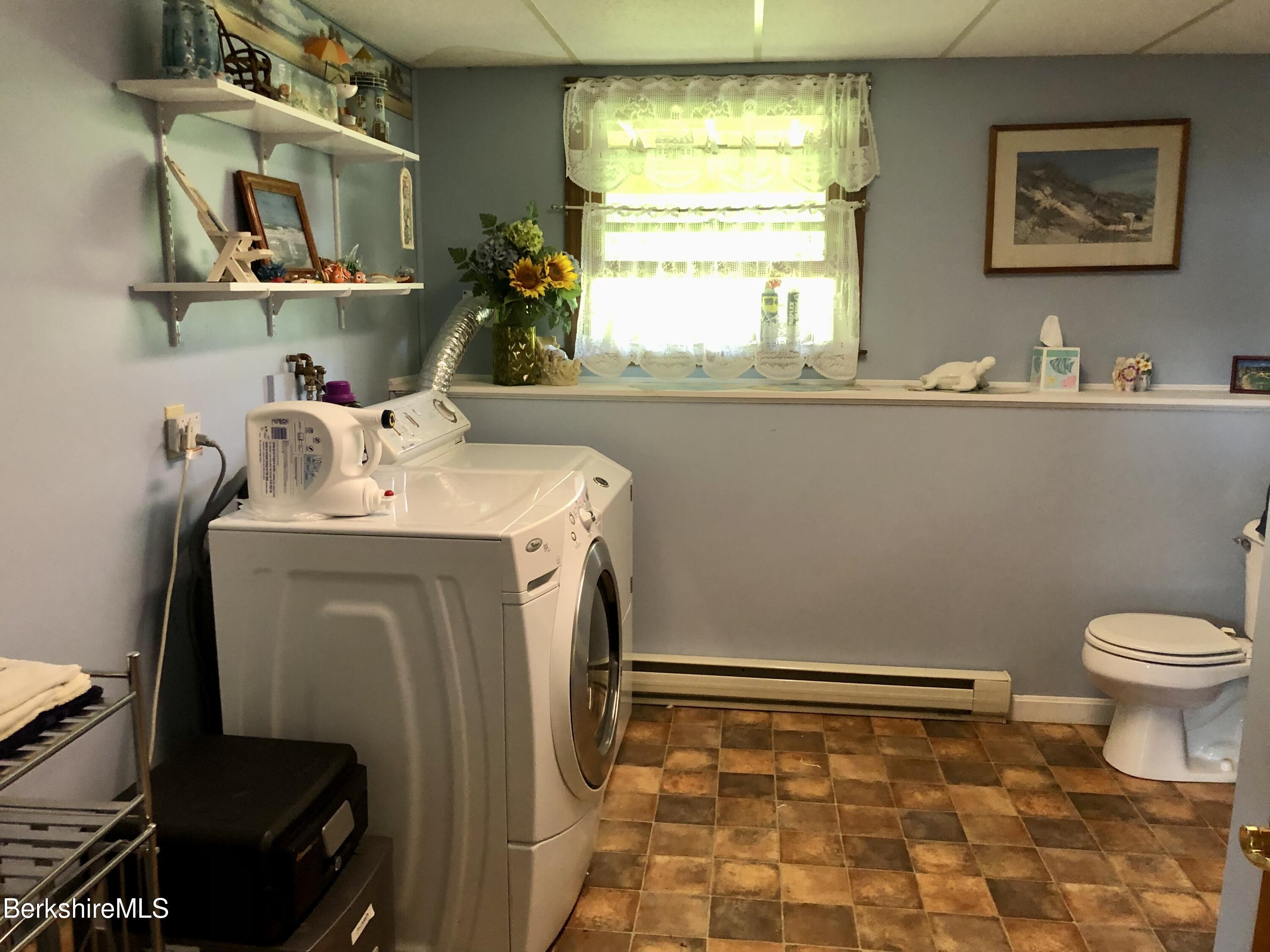 95 Bruce Drive Dalton, MA 01226 - Photo 22 of 30 a bathroom with a sink toilet and mirror