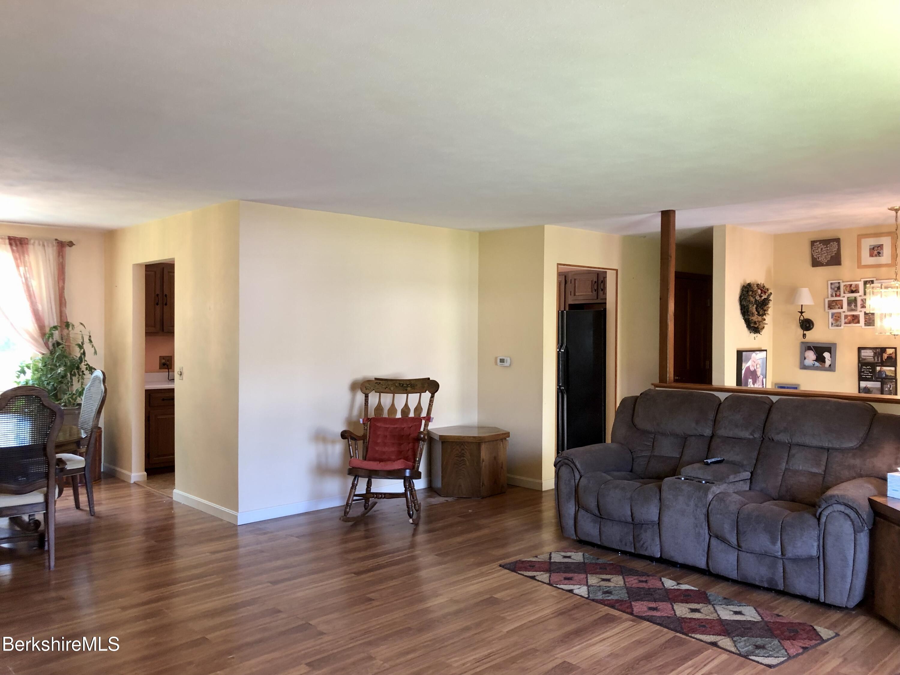95 Bruce Drive Dalton, MA 01226 - Photo 6 of 30 a living room with furniture and a wooden floor