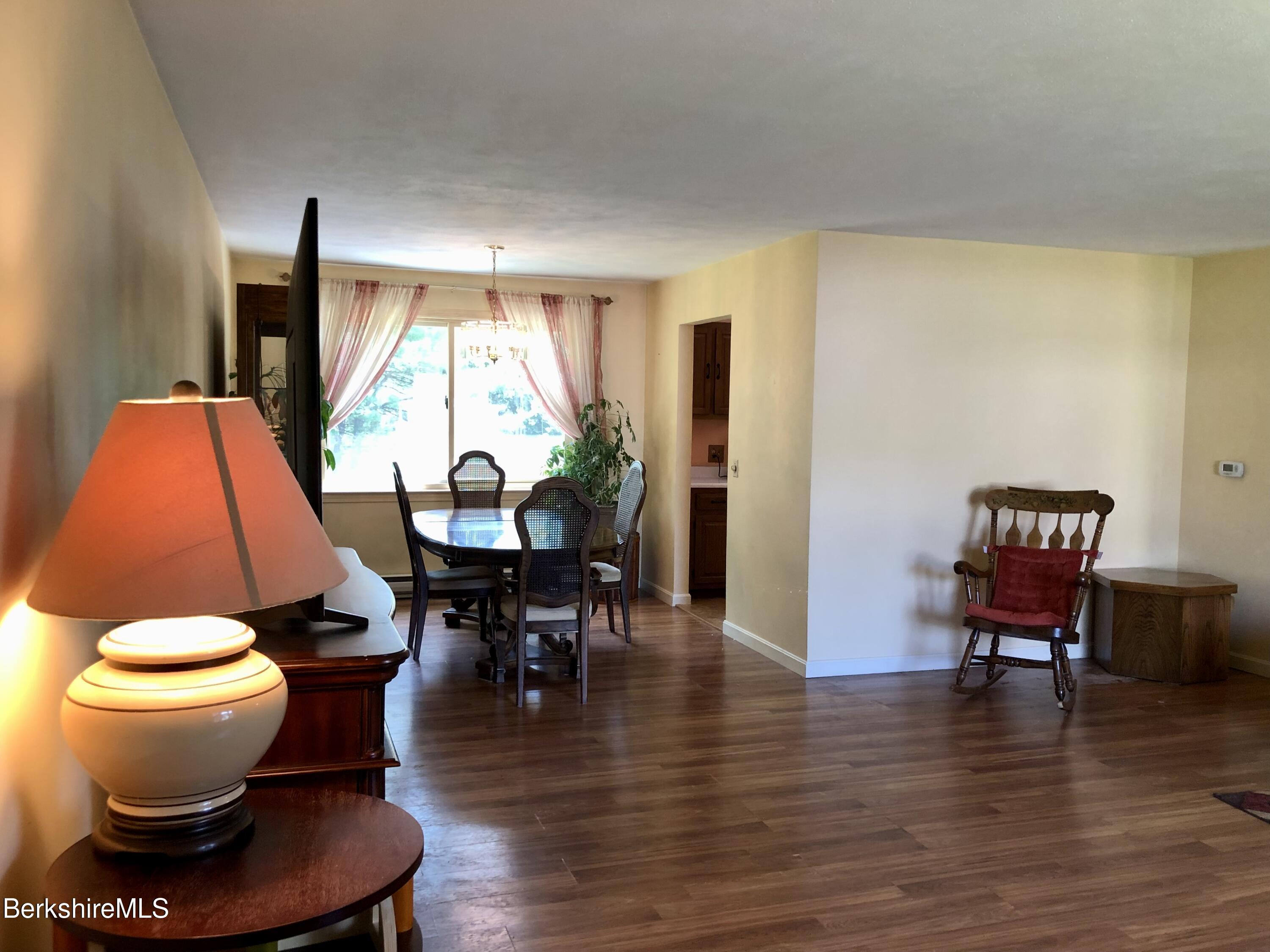 95 Bruce Drive Dalton, MA 01226 - Photo 7 of 30 a view of a dining room with furniture window and wooden floor