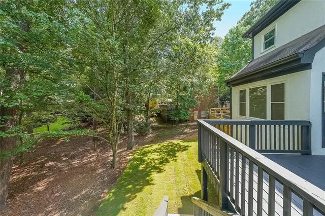 a view of balcony with garden
