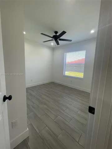 a kitchen with stainless steel appliances a refrigerator and a sink