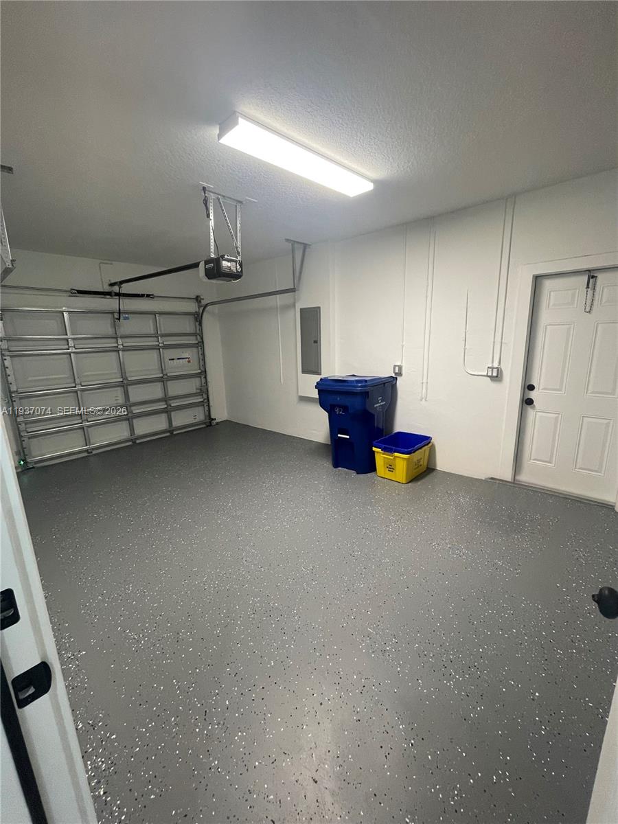 912 West 10th Street Riviera Beach, FL 33404 - Photo 21 of 24 a room with a cabinet and mirrors