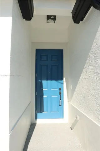 a bathroom with a tub and sink