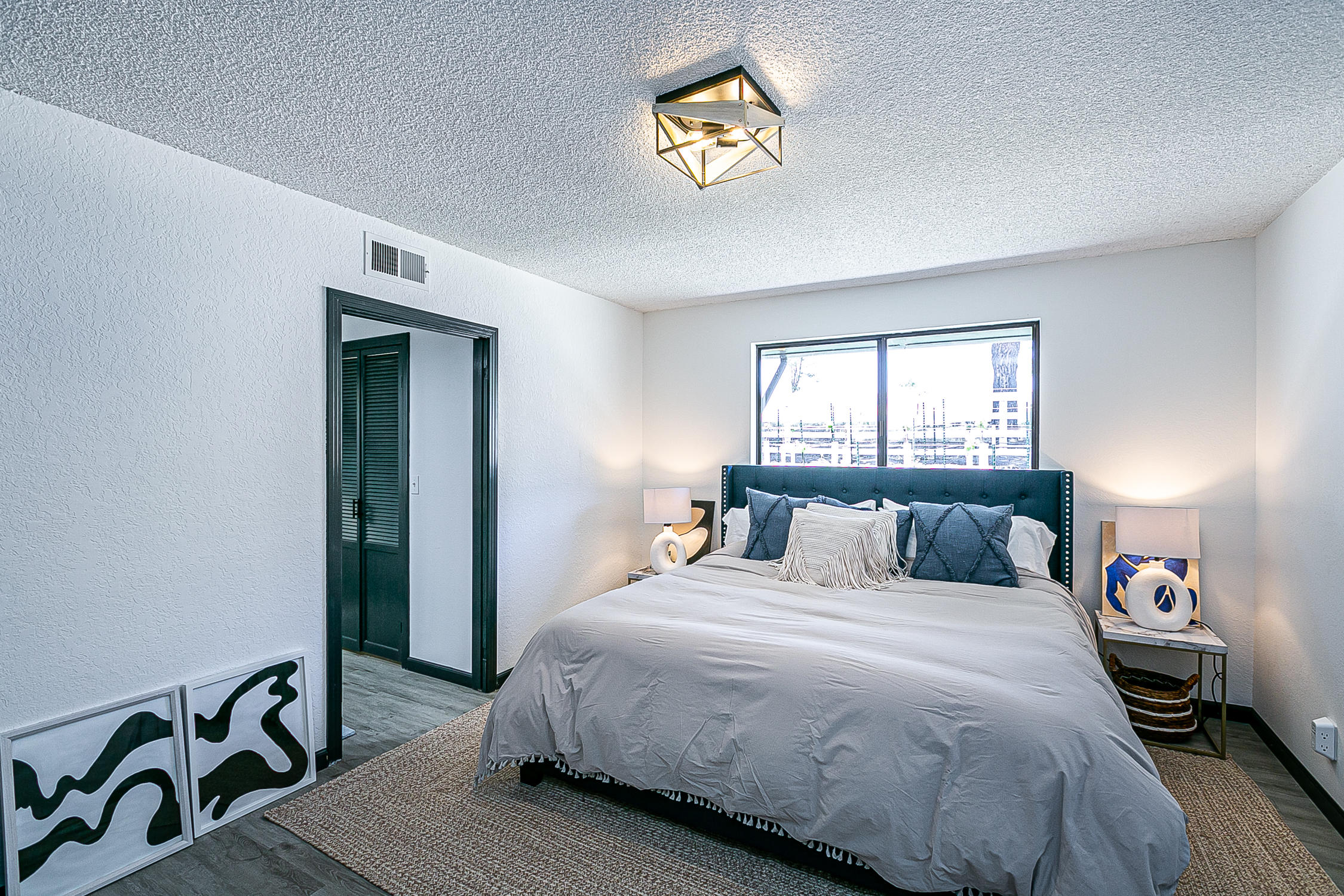 5375 Campbell Road Lompoc, CA 93436 - Photo 17 of 48 a bedroom with a bed and a table