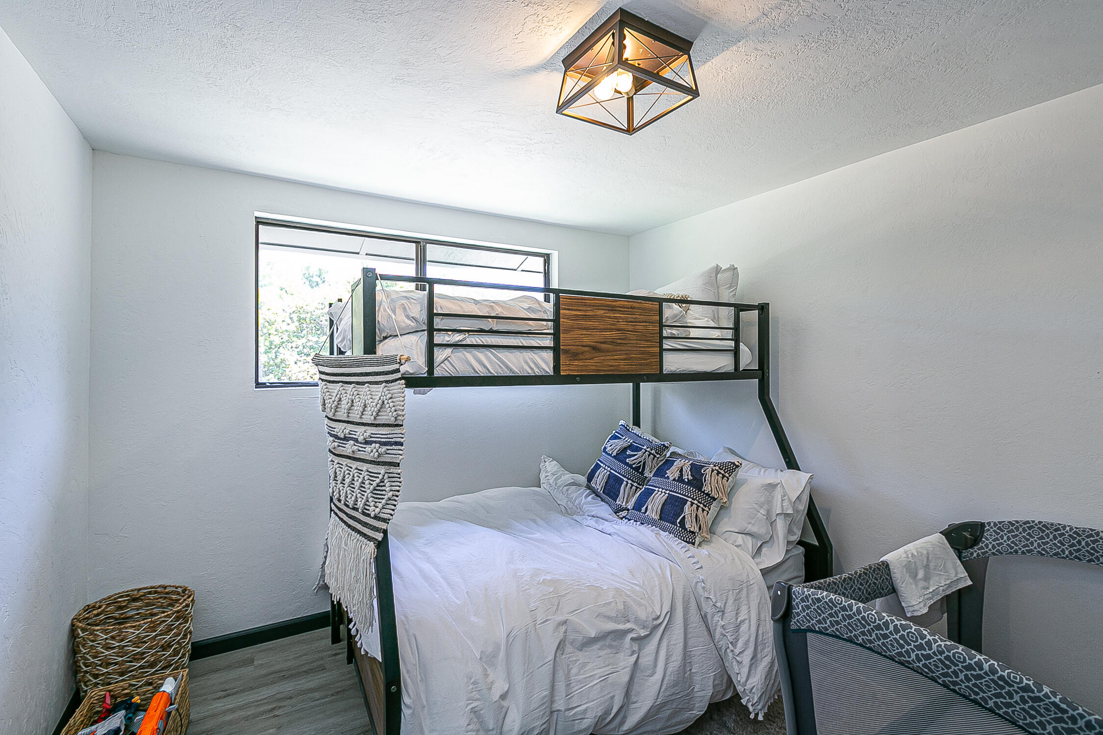 5375 Campbell Road Lompoc, CA 93436 - Photo 22 of 48 a bedroom with a bed and wooden floor