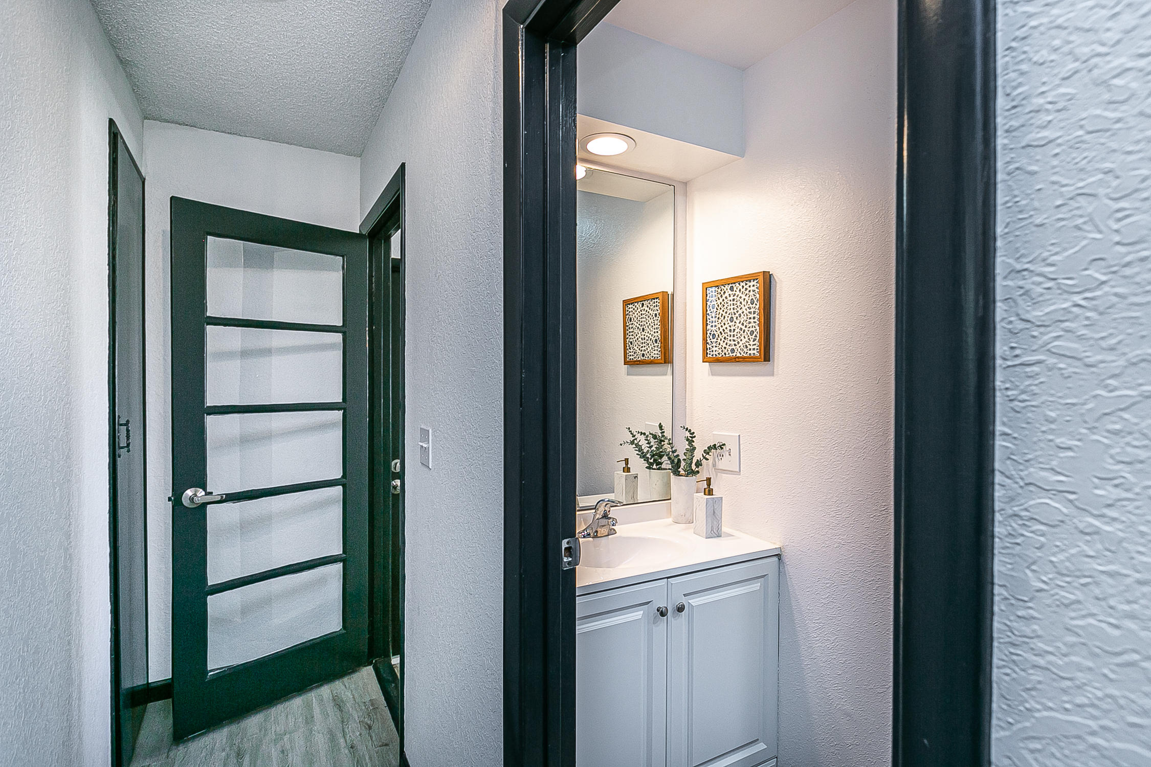 5375 Campbell Road Lompoc, CA 93436 - Photo 24 of 48 a bathroom with a sink a mirror and shower