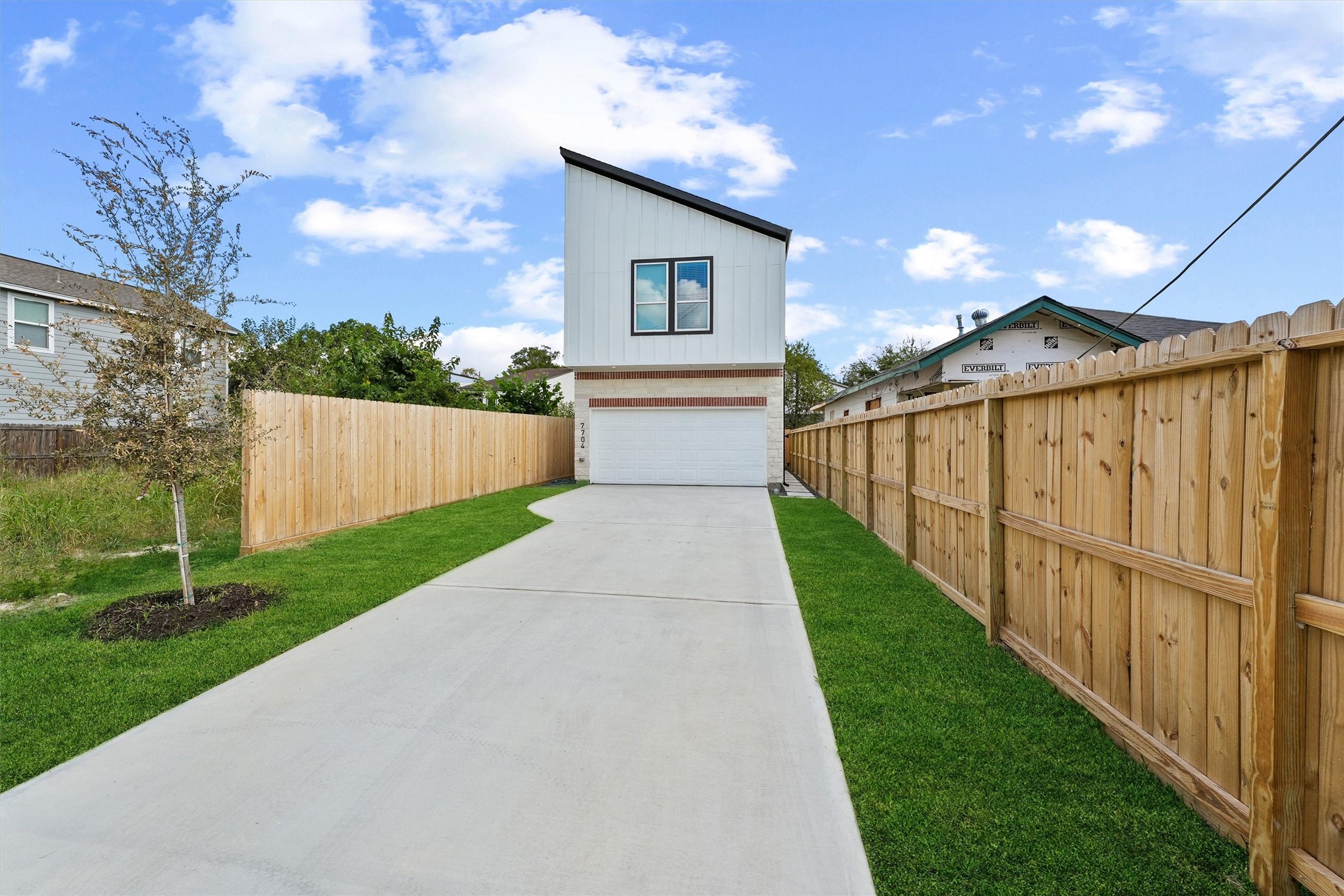 7704 Sealey Street Houston, TX 77088 - Photo 15 of 15 a front view of a house with yard