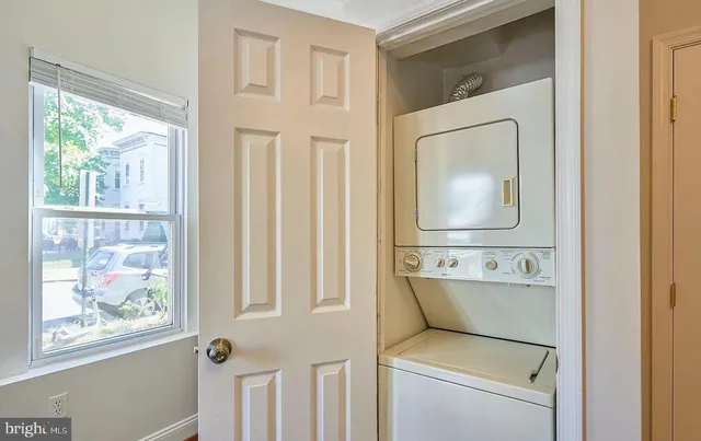 a room with a door and a wooden floor