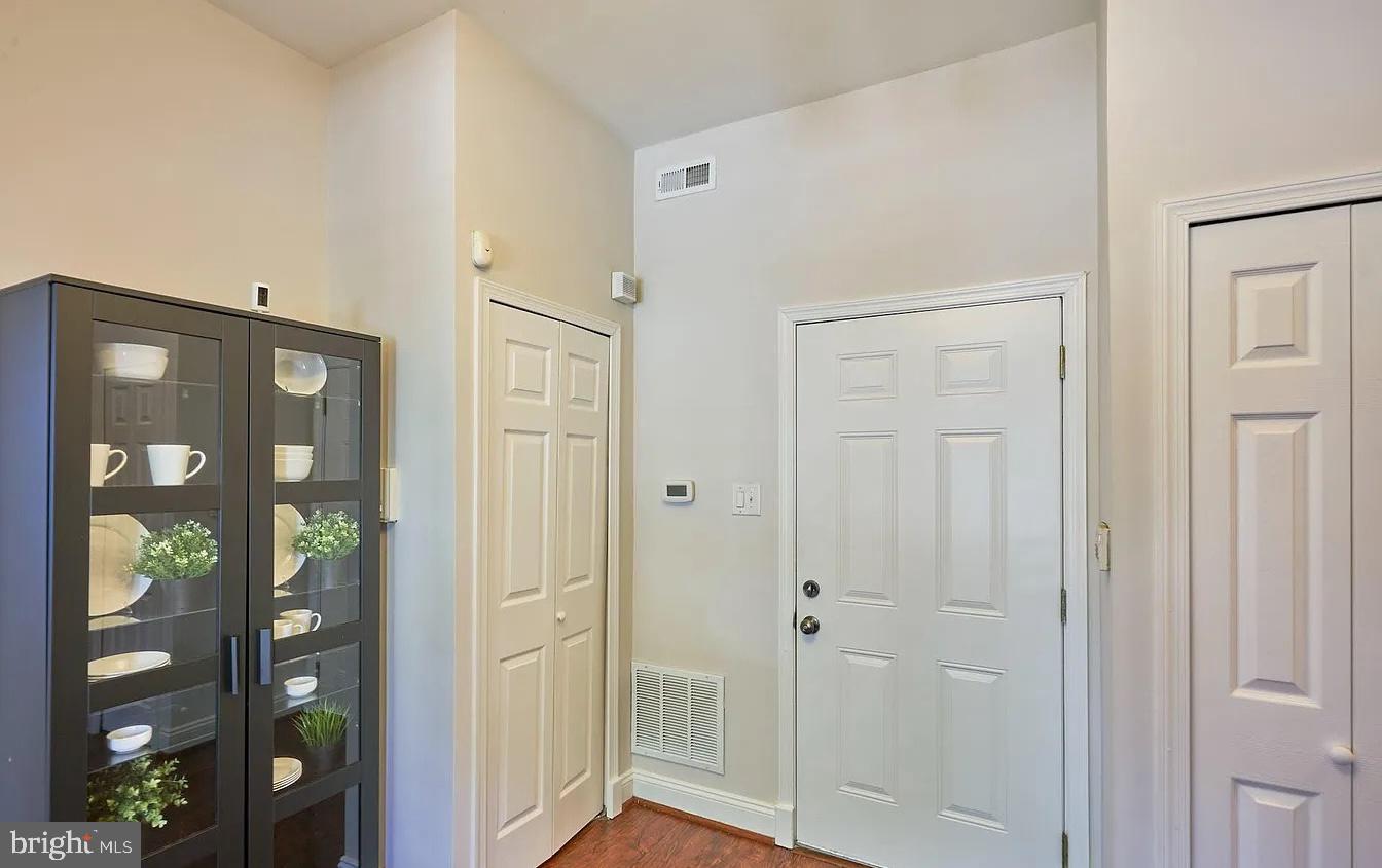 500 Florida Avenue Northwest, Unit 1 Washington, DC 20001 - Photo 7 of 20 a bathroom with a glass shower door and a window