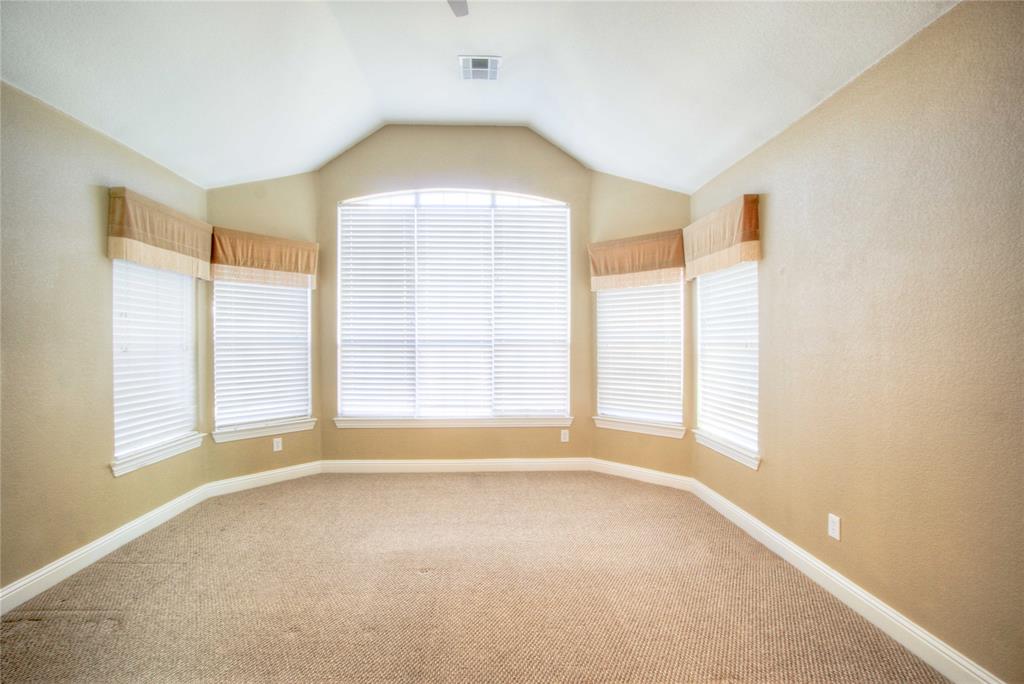 1122 Bridgeway Lane Allen, TX 75013 - Photo 11 of 22 a view of an empty room with a window