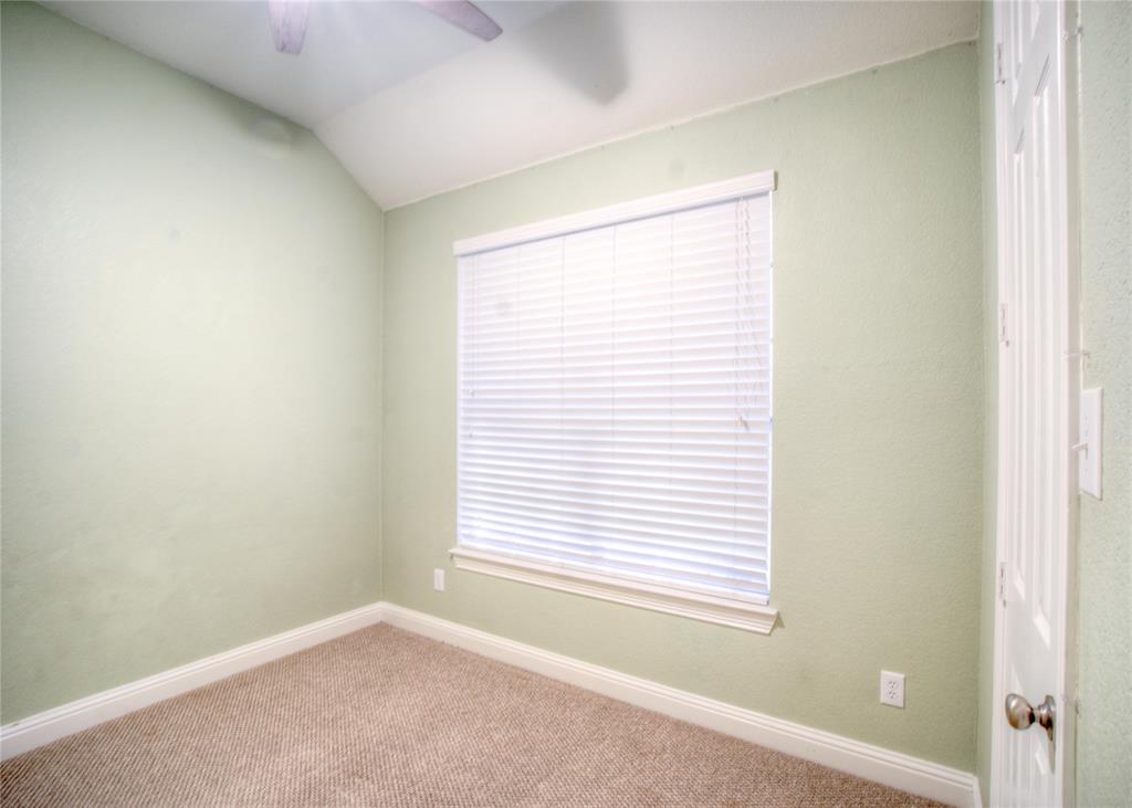 1122 Bridgeway Lane Allen, TX 75013 - Photo 17 of 22 a view of an empty room with a window
