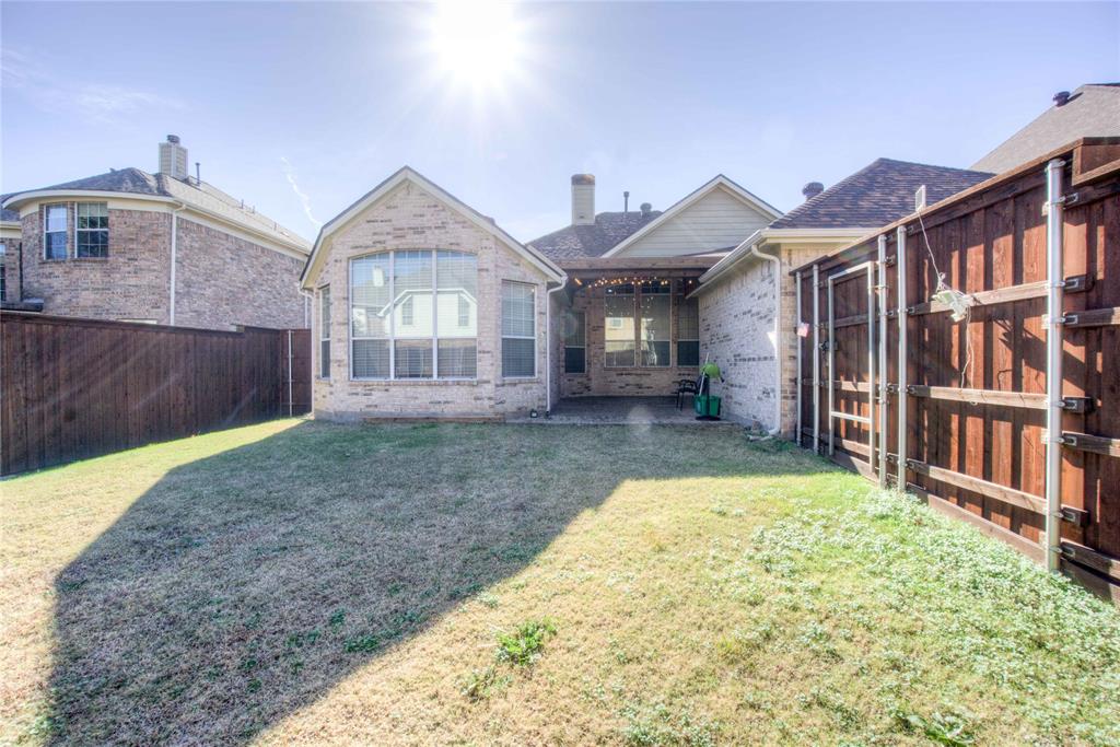 1122 Bridgeway Lane Allen, TX 75013 - Photo 18 of 22 a front view of a house with a yard