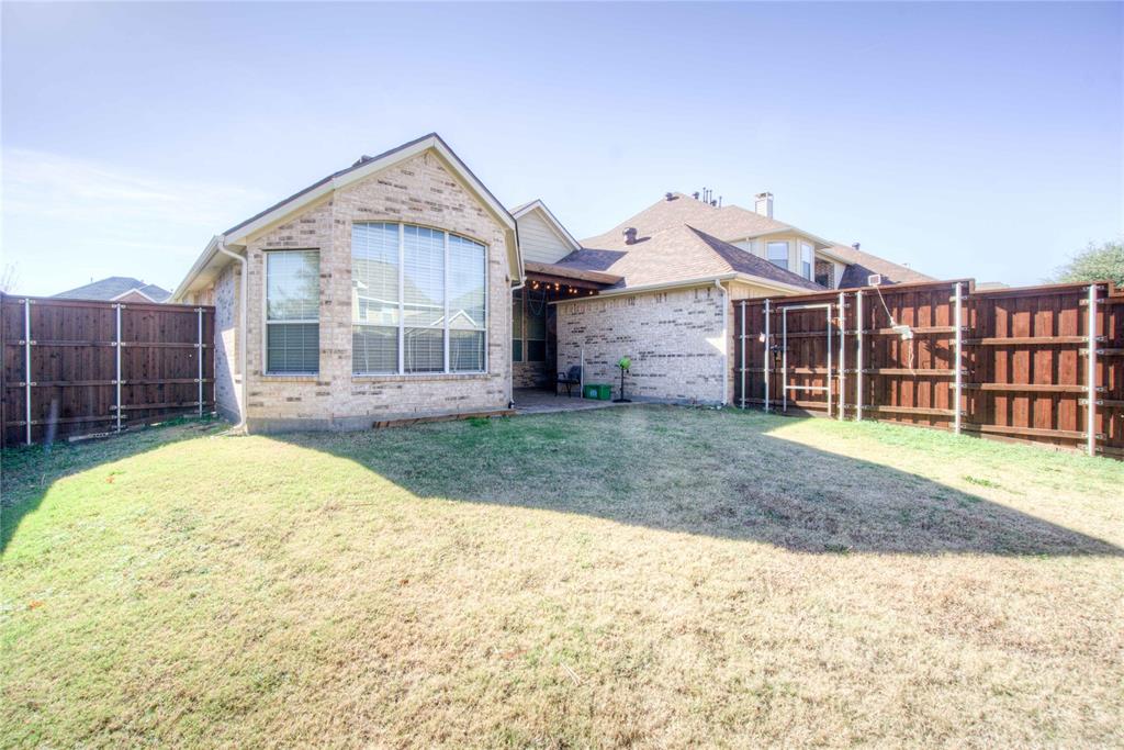 1122 Bridgeway Lane Allen, TX 75013 - Photo 19 of 22 a view of a house with a yard and sitting area