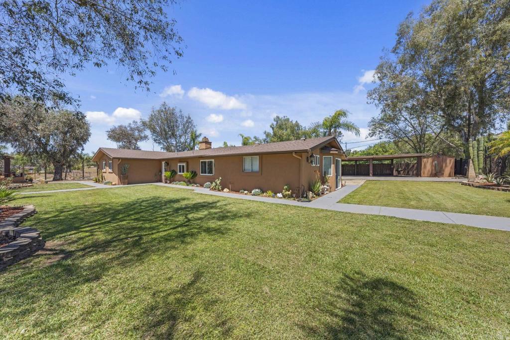 30265 Miller Road Valley Center, CA 92082 - Photo 43 of 56 front view of house with a yard