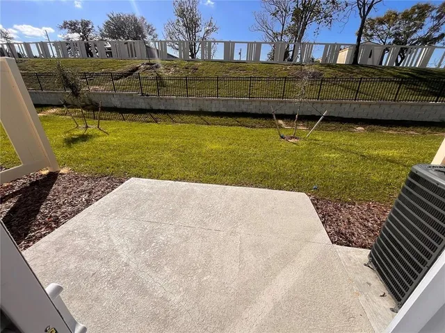 a view of a swimming pool with a lounge chairs