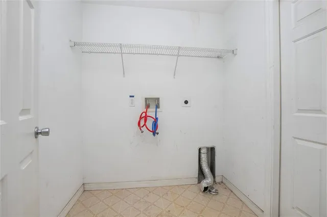 a view of a room with racks on the wall