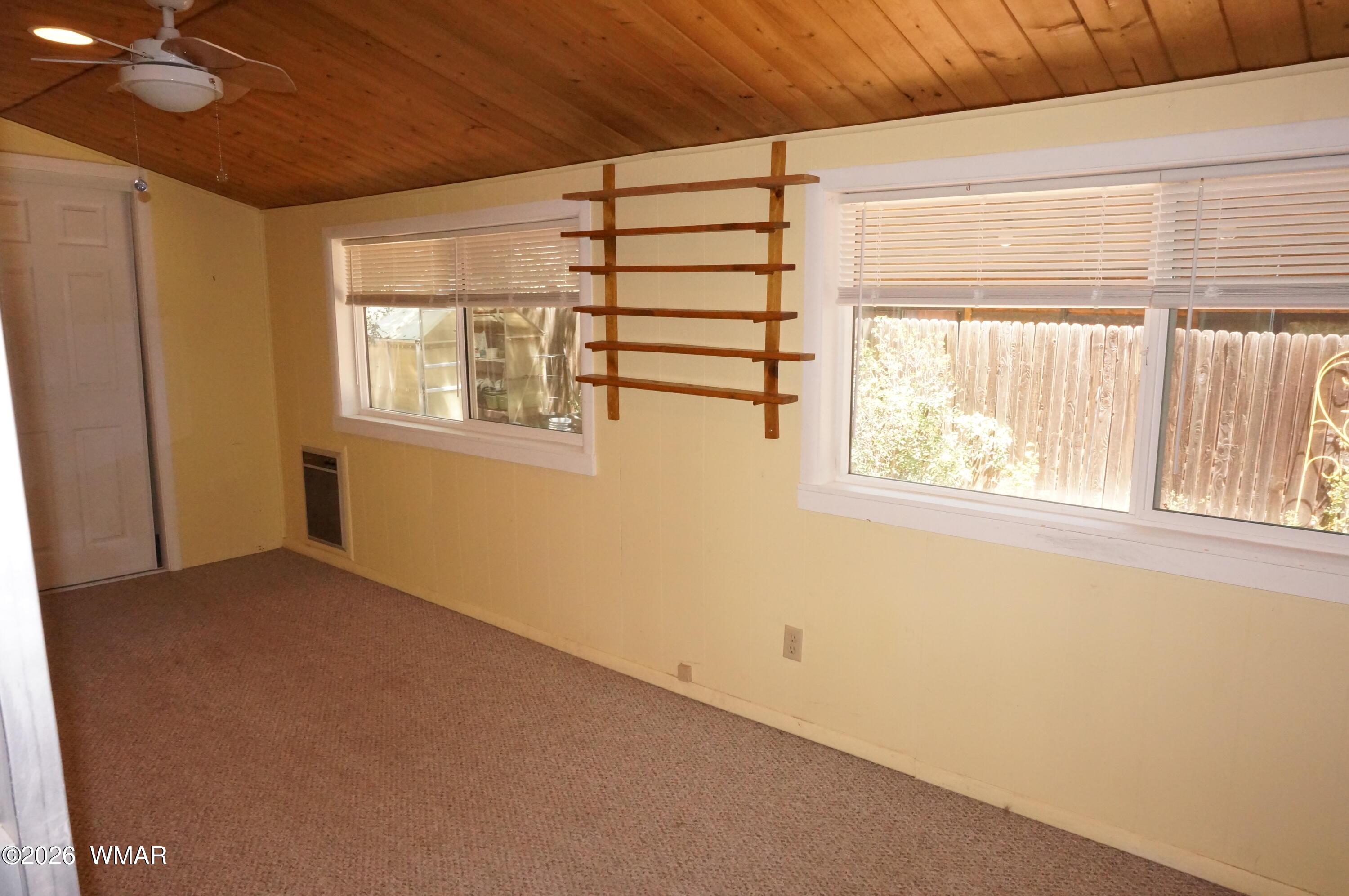 6066 Wagon Wheel Road Lakeside, AZ 85929 - Photo 18 of 32 an empty room with a window