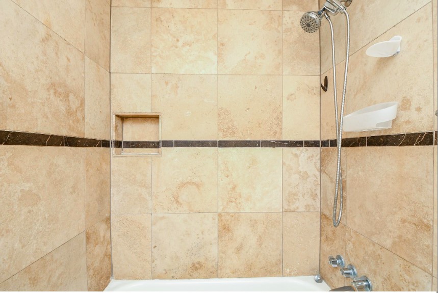 7233 Beechnut Street, Unit A Houston, TX 77074 - Photo 17 of 40 a bathroom with a shower