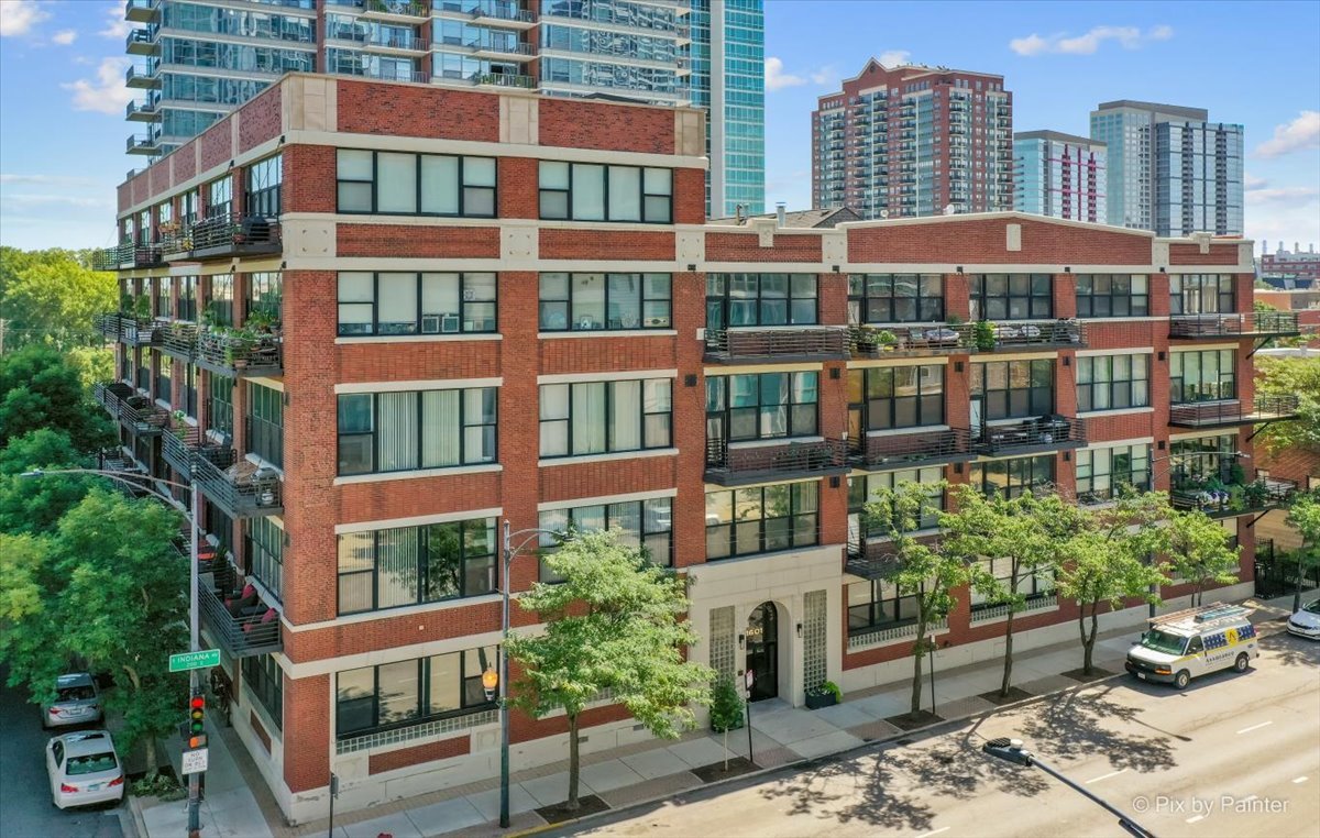 1601 South Indiana Avenue, Unit 306 Chicago, IL 60616 - Photo 1 of 25 a front view of a multi story building