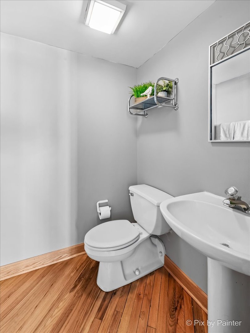 1601 South Indiana Avenue, Unit 306 Chicago, IL 60616 - Photo 12 of 25 a bathroom with a sink and a toilet