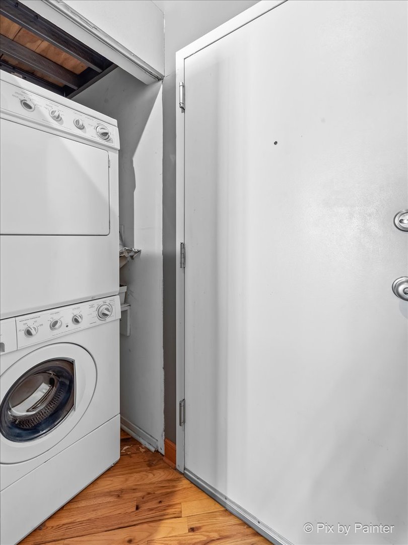 1601 South Indiana Avenue, Unit 306 Chicago, IL 60616 - Photo 13 of 25 a view of a storage & utility room with washer and dryer