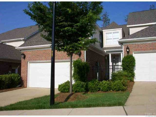 3405 Barron Berkeley Way Raleigh, NC 27612 - Photo 1 of 1 a front view of a house with garden