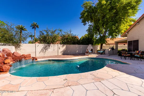 a view of outdoor space yard and swimming pool