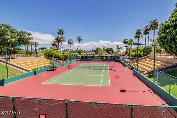 a tennis court that has tennis net