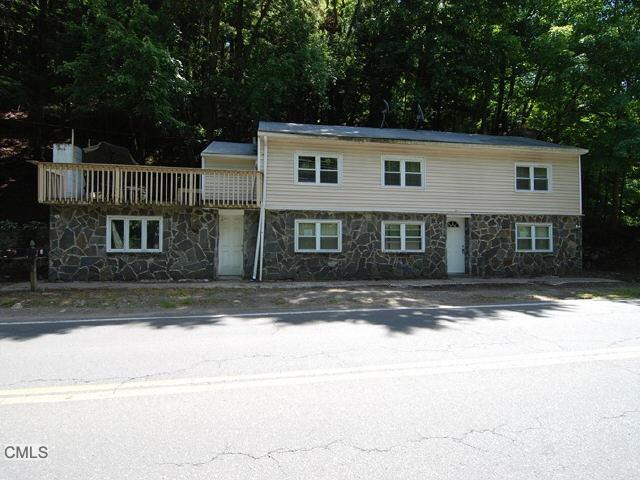 34 Glen Road Newtown, CT 06482 - Photo 1 of 1 a house that has a tree in front of it