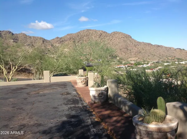 a view of a terrace with a bench