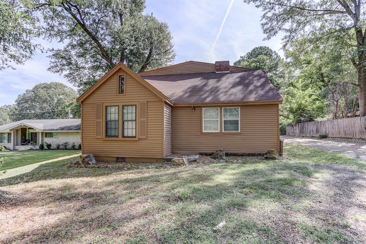 3700 Lakeview Road Memphis, TN 38116 - Photo 2 of 40 View of front of house with a shingled roof, crawl space, and a chimney