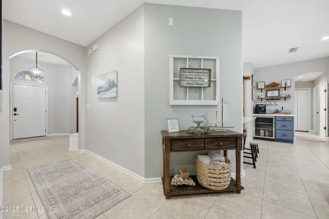 a view of workspace with furniture and natural light