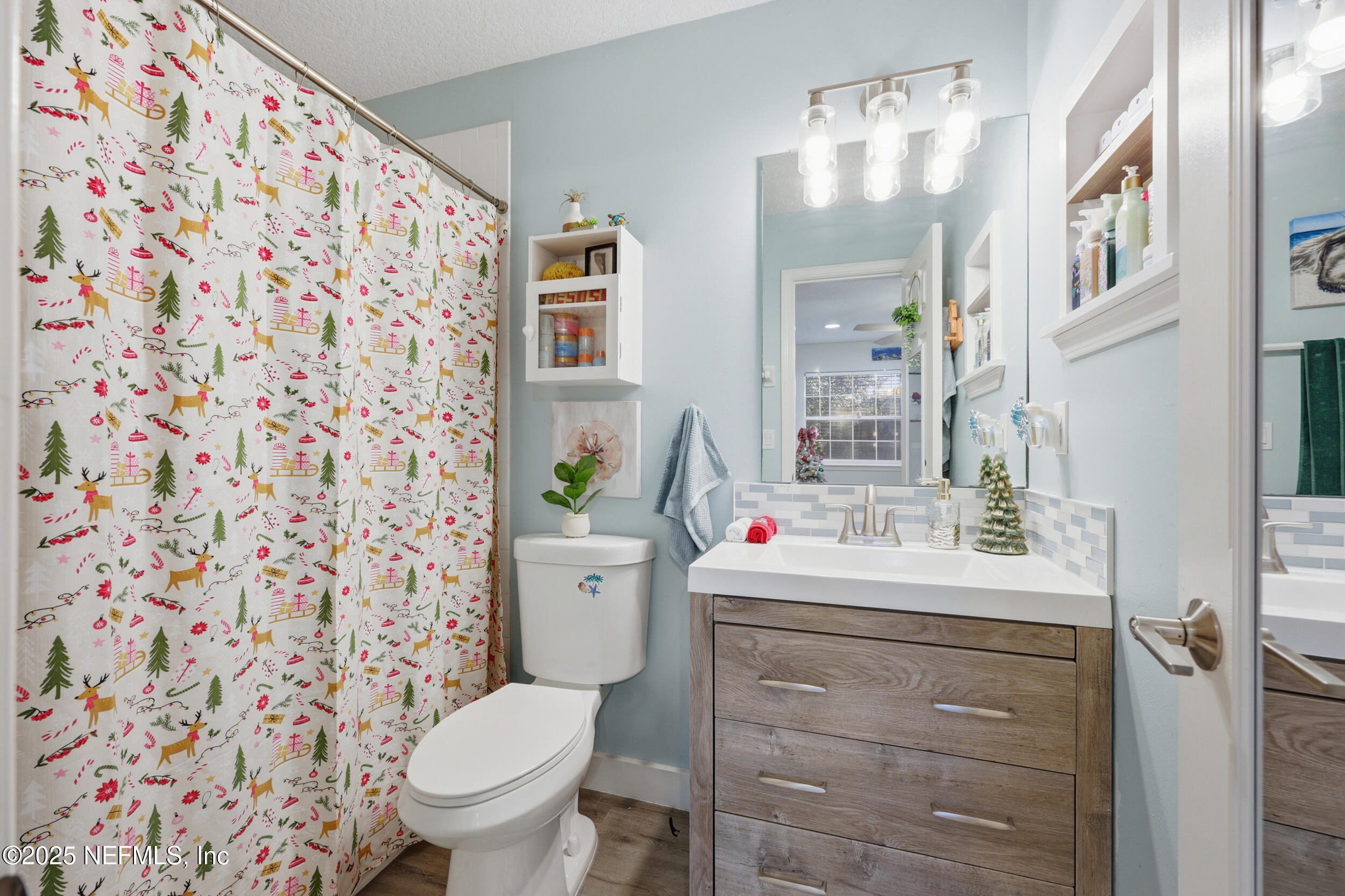 177 Summerhill Circle St. Augustine, FL 32086 - Photo 32 of 42 a bathroom with a sink toilet and shower