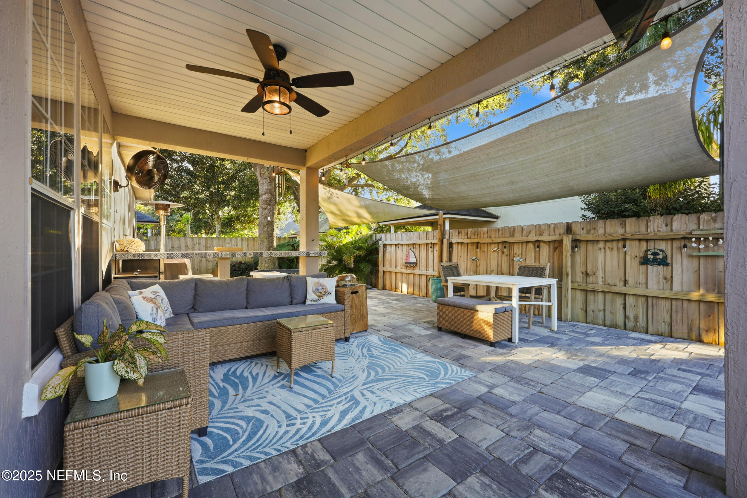 177 Summerhill Circle St. Augustine, FL 32086 - Photo 33 of 42 a living room with furniture and a table