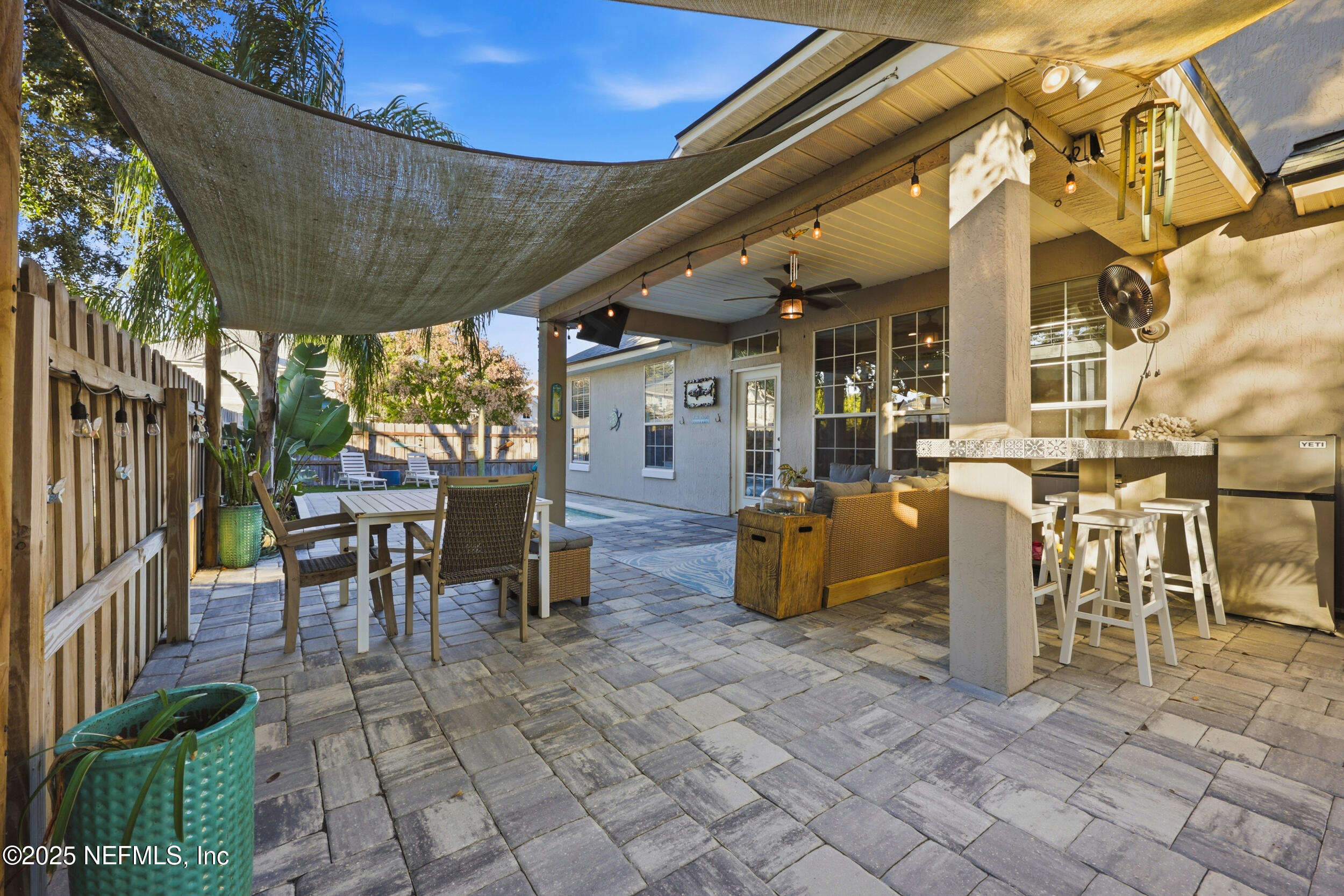 177 Summerhill Circle St. Augustine, FL 32086 - Photo 37 of 42 a view of a patio with table and chairs