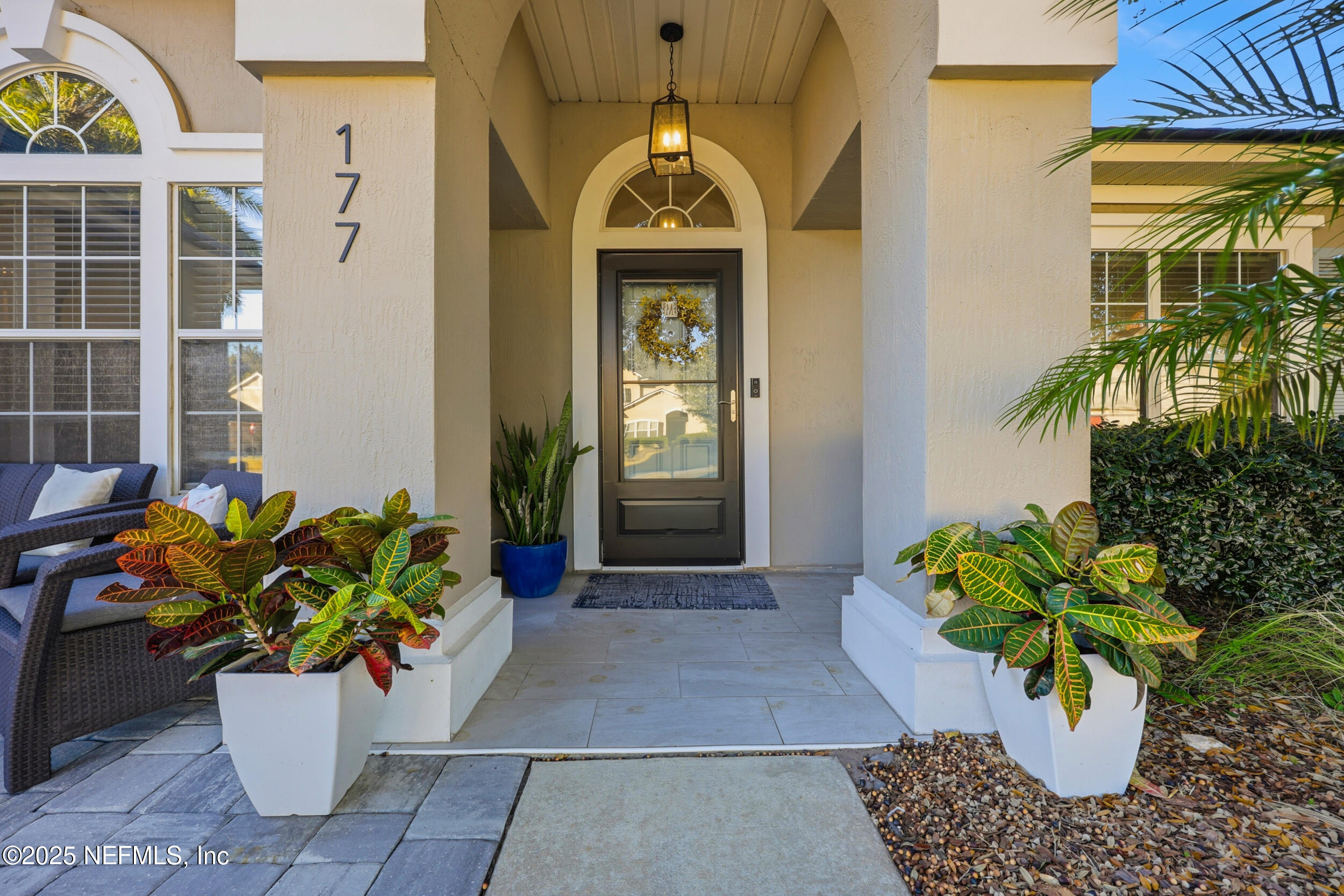 177 Summerhill Circle St. Augustine, FL 32086 - Photo 4 of 42 a view of a potted flower in the corridor