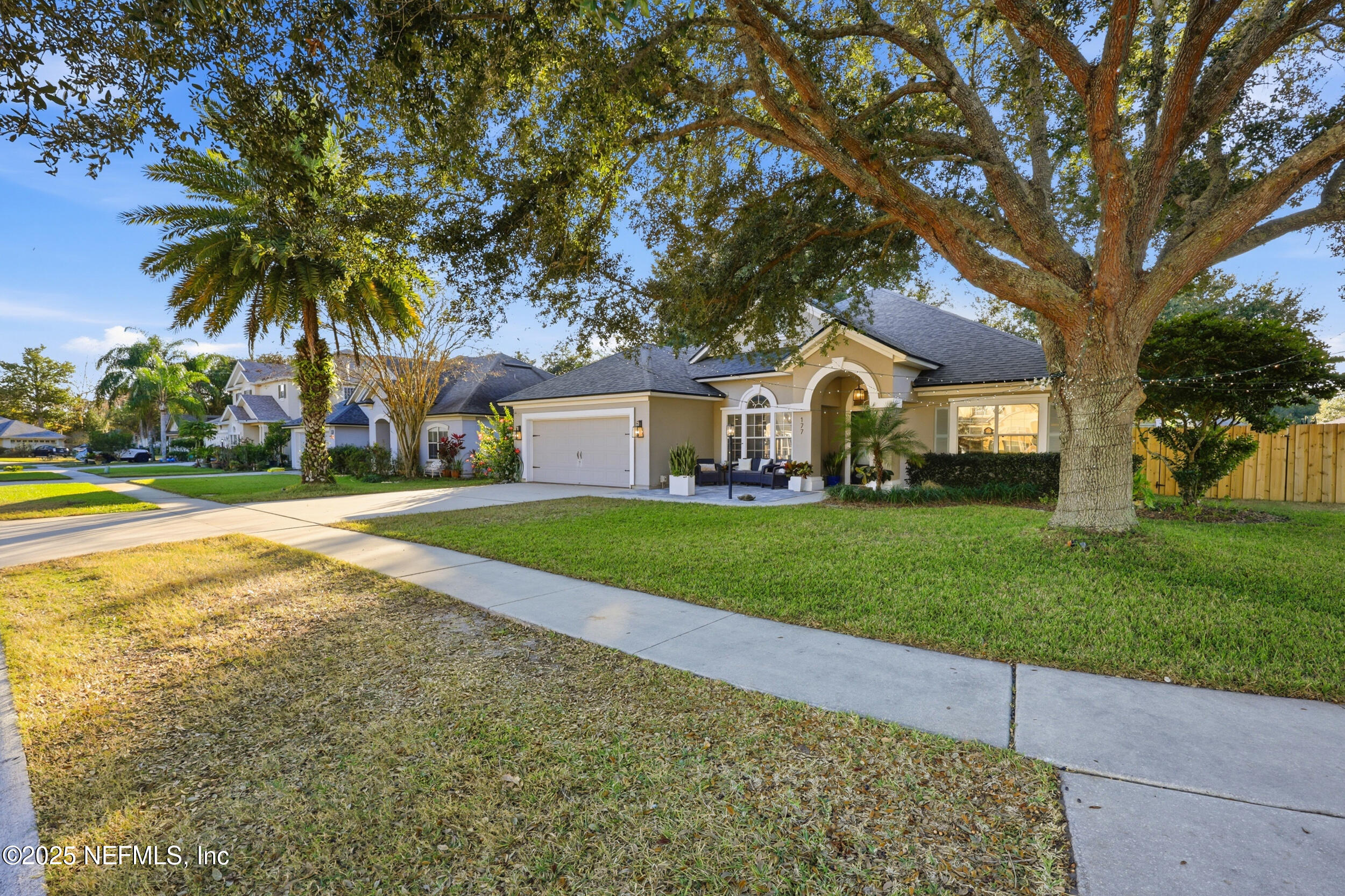 177 Summerhill Circle St. Augustine, FL 32086 - Photo 41 of 42 a front view of a house with garden